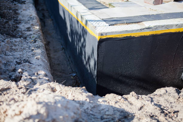 Professional Waterproofing technician working in Hugo, MN